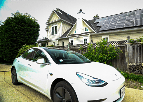 Solar Electric Vehicle Charging Solutions, image of tesla charging